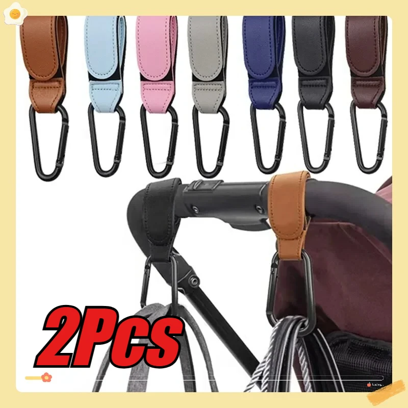 Accessoire poussette portesac 2 pièces cuir synthétique sangles