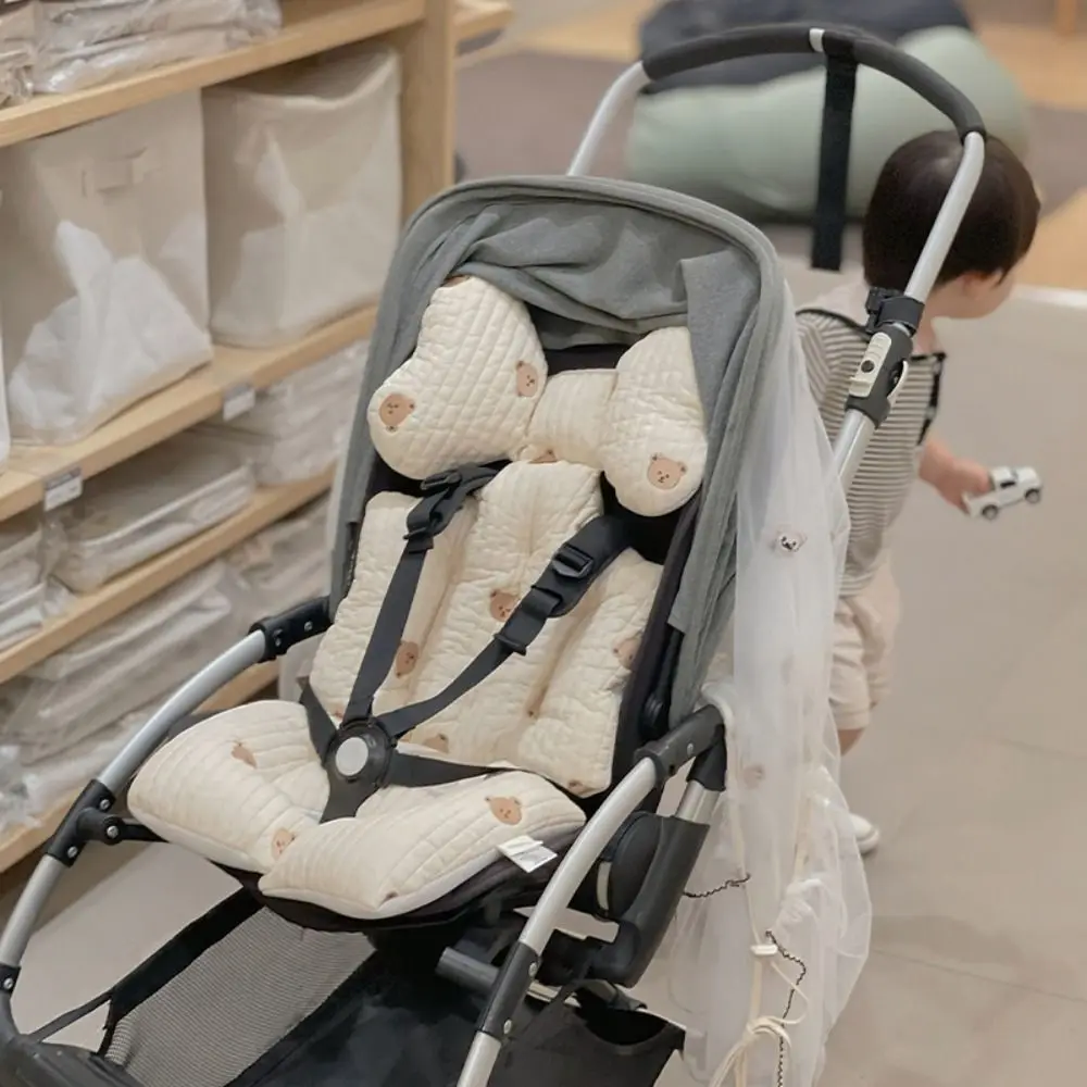 Poussette bébé moderne avec coussin rembourré en polyester design épuré