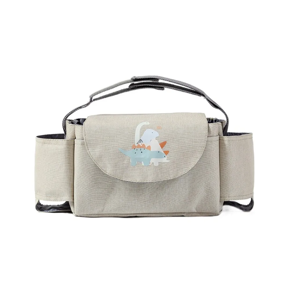 Sac de poussette multifonctionnel avec poches intégrées design ludique