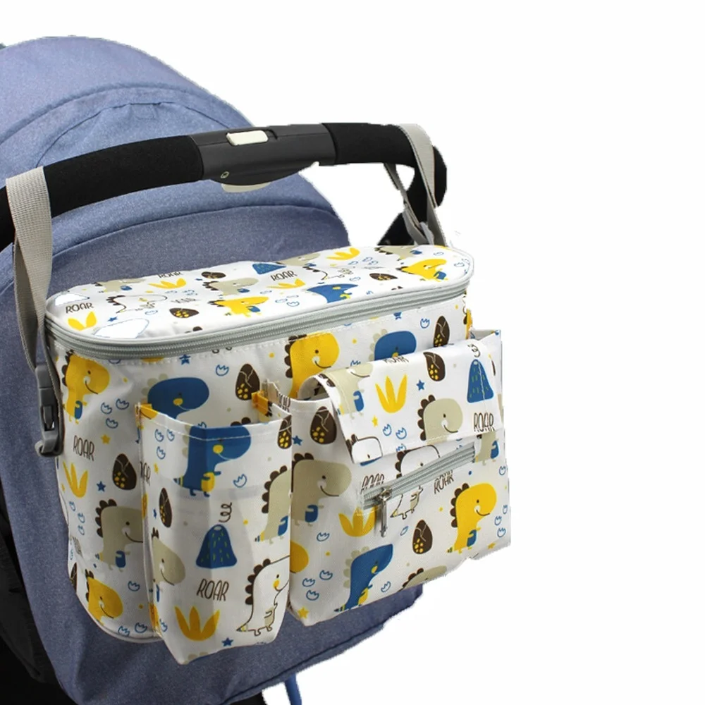 Sac de poussette grande capacité imperméable avec poches multiples et design animaux fixations pratiques pour