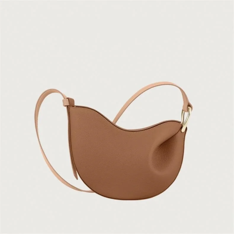 Sac fourretout en cuir souple design minimaliste bean shape usage quotidien portable élégant haute qualité sac