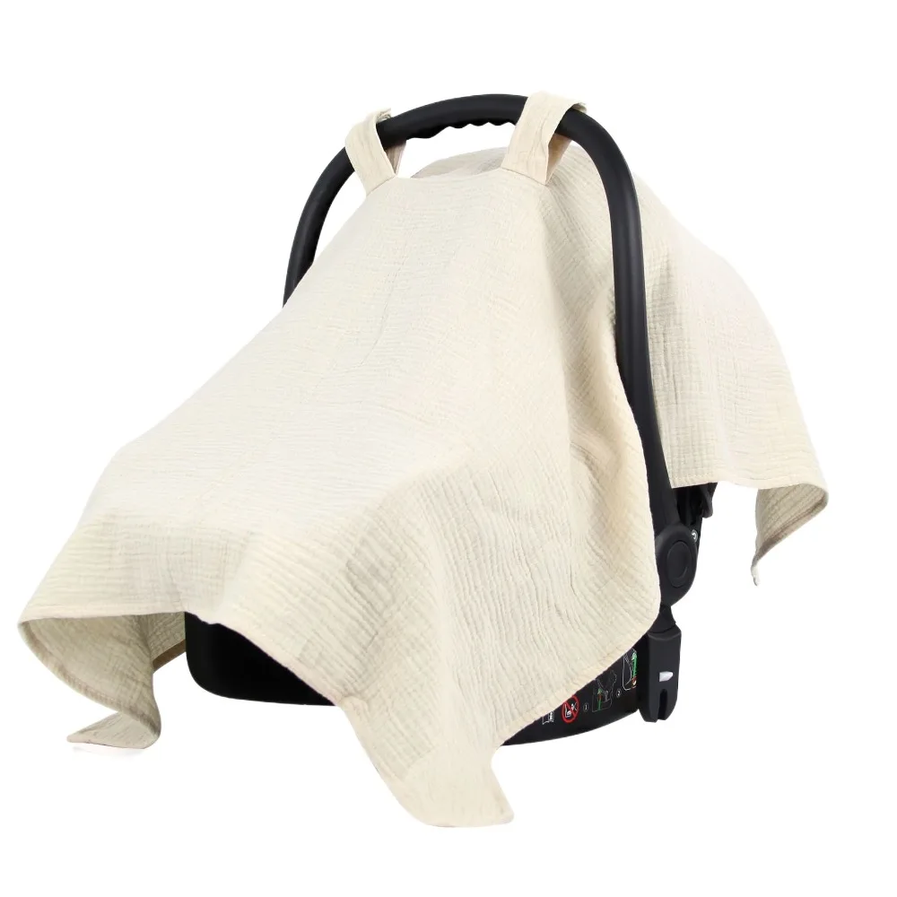 Couverture de siège auto bébé en tissu doux protection soleil clips intégrés beige confortable et sécurisé pou